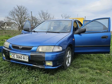 Авто Mazda 323 1998 № 8704176