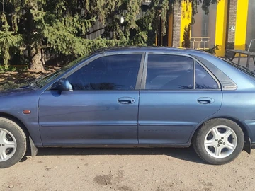 Авто Mitsubishi Proton 1996 № 8709201