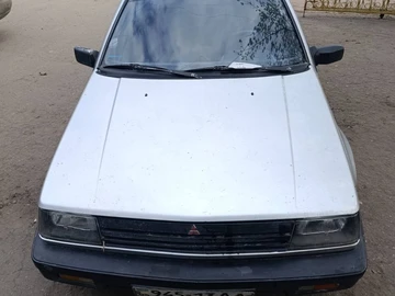 Авто Mitsubishi Lancer 1987 № 8709550