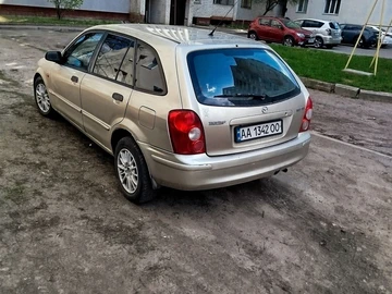 Авто Mazda 323 2002 № 8709554