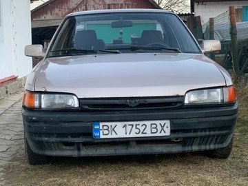 Авто Mazda 323 1996 № 8710701