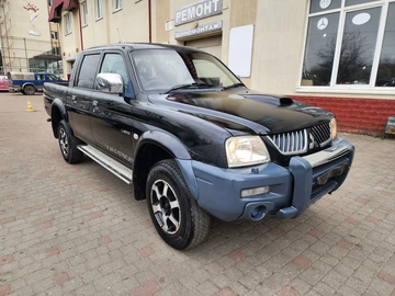 Авто Mitsubishi L 200 2005 № 8710890