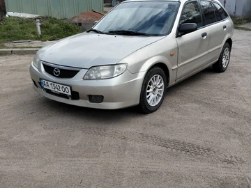 Авто Mazda 323 2002 № 8711841