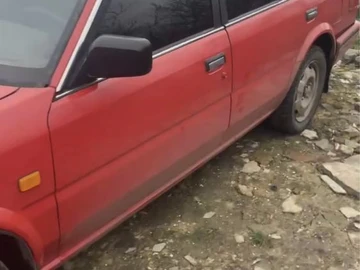 Авто Nissan Bluebird 1990 № 8717392