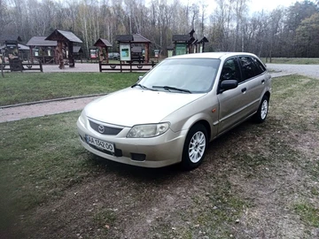 Авто Mazda 323 2002 № 8721384