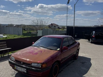 Авто Mazda 323 1995 № 8727418
