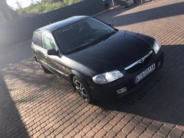 Авто Mazda 323 2000 № 8727570