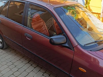 Авто Mazda 323 1998 № 8737940