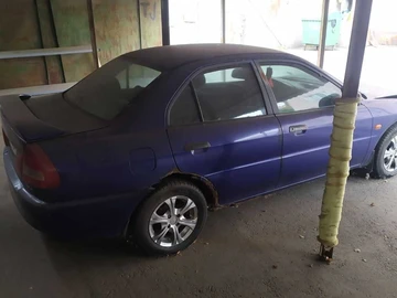 Авто Mitsubishi Lancer 1993 № 8739934