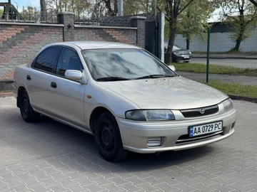 Авто Mazda 323 1998 № 8743497