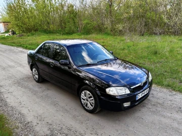 Авто Mazda 323 2000 № 8751775