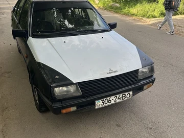 Авто Mitsubishi Lancer 1990 № 8754423