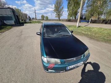 Авто Mazda 323 1997 № 8756159