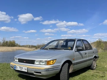Авто Mitsubishi Lancer 1990 № 8757677