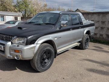 Авто Mitsubishi L 200 2004 № 8760388
