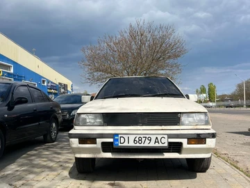 Авто Mitsubishi Colt Lancer 1988 № 8763781