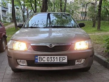 Авто Mazda 323 2000 № 8764460