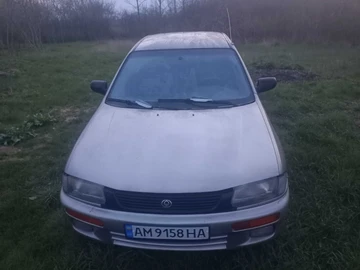 Авто Mazda 323 1997 № 8768602