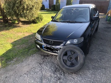 Авто Mazda 323 2001 № 8780734
