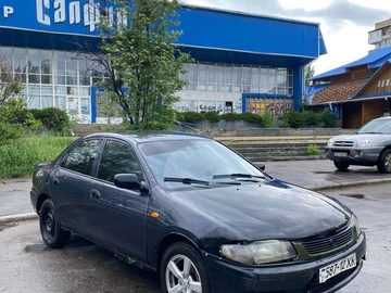 Авто Mazda 323 1999 № 8785609