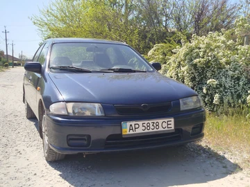 Авто Mazda 323 1998 № 8802458