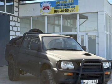 Авто Mitsubishi L 200 2001 № 8802620