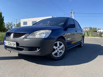 Авто Mitsubishi Lancer 2003 № 8803684