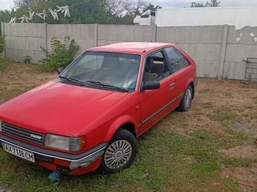 Авто Mazda 323 1996 № 8806667