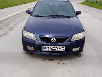 Авто Mazda 323 2001 № 8809044