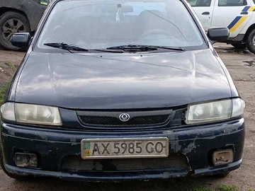 Авто Mazda 323 1997 № 8809661