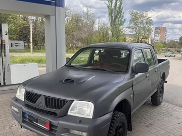 Авто Mitsubishi L 200 2004 № 8811132