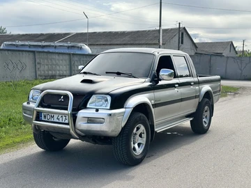 Авто Mitsubishi L 200 2004 № 8815175