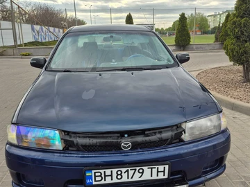 Авто Mazda 323 1998 № 8817174