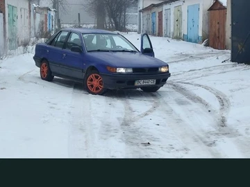 Авто Mitsubishi Lancer 1993 № 8818373