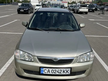 Авто Mazda 323 1998 № 8818875
