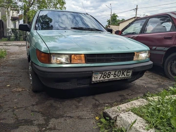 Авто Mitsubishi Lancer 1990 № 8827613