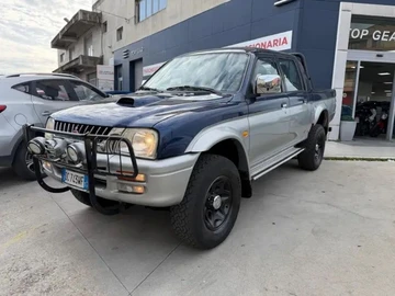 Авто Mitsubishi L 200 2004 № 8830914