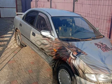 Авто Mazda 323 1996 № 8831655