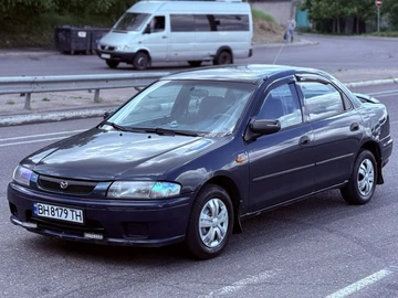 Авто Mazda 323 1998 № 8833128