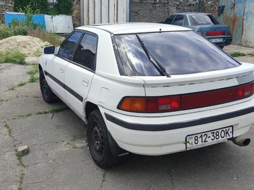 Авто Mazda 323 1990 № 8834388