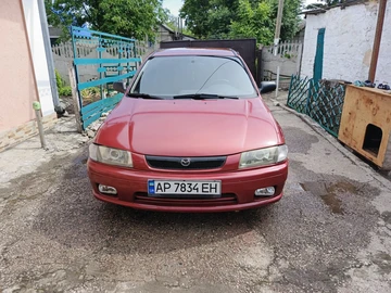 Авто Mazda 323 1997 № 8834554