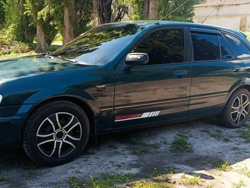 Авто Mazda 323 1998 № 8836885