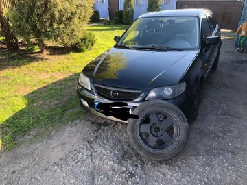 Авто Mazda 323 2001 № 8837688
