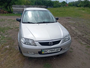 Авто Mazda 323 2001 № 8839080