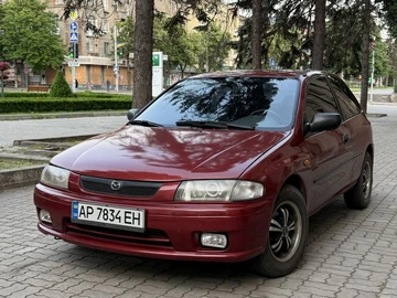 Авто Mazda 323 1997 № 8843229