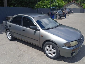 Авто Mazda 323 1995 № 8848864