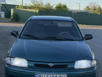 Авто Mazda 323 1997 № 8854339