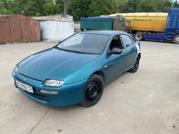 Авто Mazda 323 1997 № 8859420