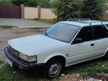 Авто Nissan Bluebird 1988 № 8865107