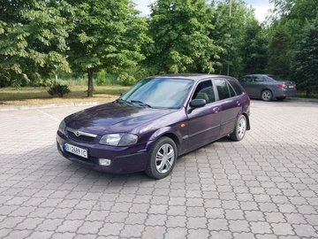 Авто Mazda 323 2004 № 8868898